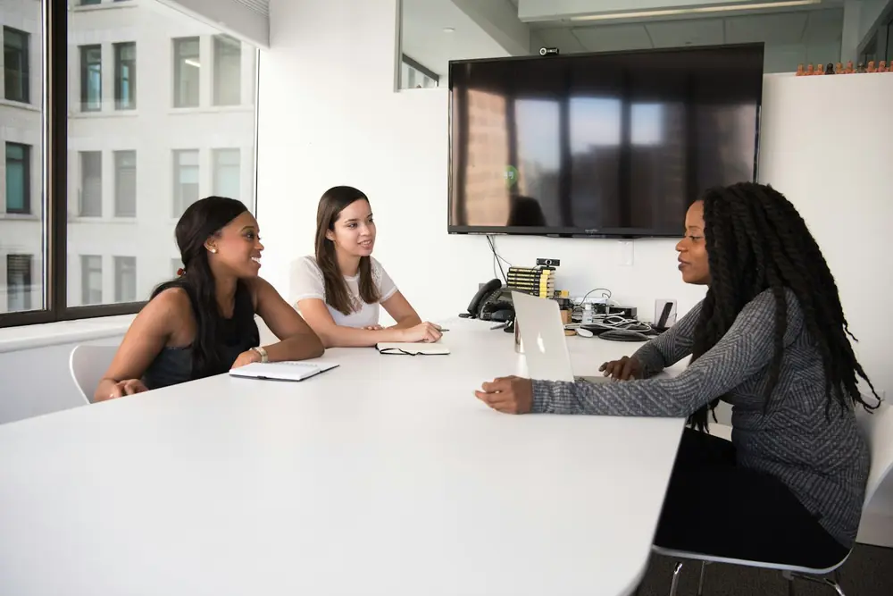 Ind Pro Professionals meeting around a conference table