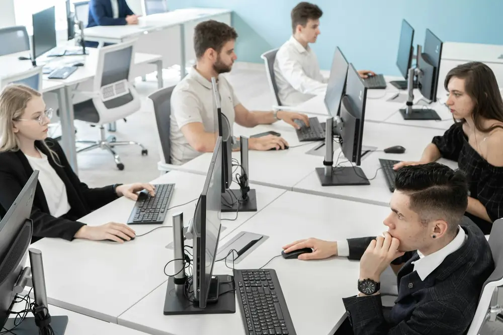Ind Saas Engineers working in an open office