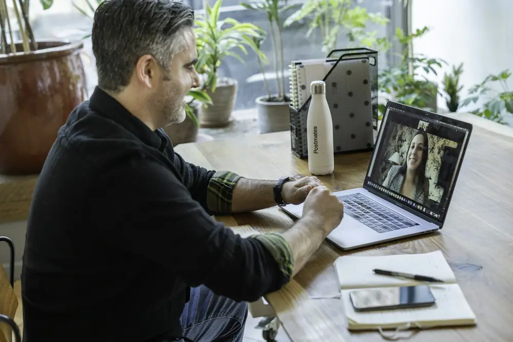 Manager Remote Manager on a video call with a remote teammate