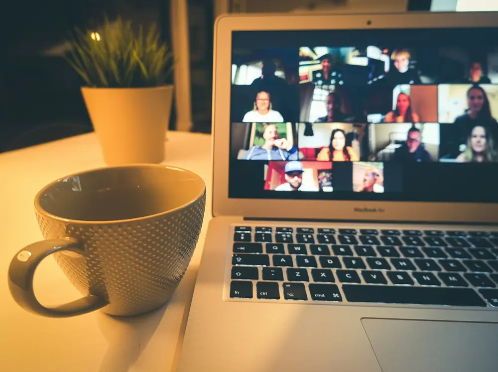 Offshore team member on a video call with colleagues